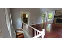 View of a living room and hardwood floors from upstairs at 344 Ansley Brook Dr, Lawrenceville, GA 30044