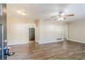Bright living room featuring hardwood floors and a ceiling fan at 2543 Brentwood Rd, Decatur, GA 30032