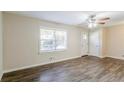 Living room with hardwood floors and neutral color palette at 2543 Brentwood Rd, Decatur, GA 30032