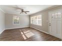 Bright living room with hardwood floors and neutral walls at 4252 Lamar St, Decatur, GA 30035