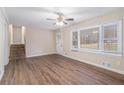 Spacious living room featuring hardwood floors and large windows at 3986 Holland Dr, Douglasville, GA 30135