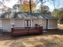 Newly painted home featuring a deck and spacious backyard at 2490 Brentwood Rd, Decatur, GA 30032