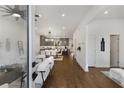 Bright and spacious entryway with hardwood floors and views of the living area and kitchen at 60 Newcastle Sw St, Atlanta, GA 30314