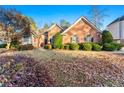 Brick front of house with manicured lawn at 3470 Hearthstone Pl, Douglasville, GA 30135