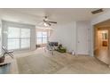 Living room with an open concept and access to other rooms at 5439 Village Rdg, Fairburn, GA 30213