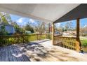 View of a wooden deck, perfect for relaxing outdoors at 70 Caroline Ave, Stockbridge, GA 30281