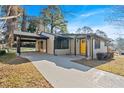 Ranch style home with carport and landscaped yard at 2142 Cloverdale Se Dr, Atlanta, GA 30316