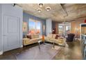 Tan couches and large windows in this open living room at 285 Centennial Olympic Park Nw Dr # 401, Atlanta, GA 30313