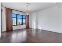 Bright living room with hardwood floors and city view at 565 Peachtree Ne St # 1509, Atlanta, GA 30308