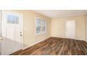 Bright living room with hardwood floors and neutral walls at 1883 Meadow Ln, Decatur, GA 30032