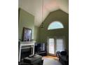 Spacious living room featuring a fireplace and hardwood floors at 8228 River Pointe Overlook, Winston, GA 30187