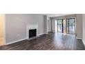 Hardwood floors and fireplace in the living room at 2101 Pine Heights Ne Dr, Atlanta, GA 30324