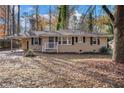 Charming brick ranch home nestled amongst mature trees at 245 Bromack Se Dr, Atlanta, GA 30315