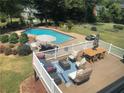 Elevated deck overlooks the pool and backyard at 1721 Berry Ln, Snellville, GA 30078