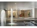 Elegant lobby with fountain and modern artwork at 147 15Th Ne St # 8B, Atlanta, GA 30309