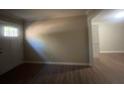 Bright entryway with hardwood floors and view to living room at 2785 Battle Forrest Dr, Decatur, GA 30034