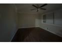 Spacious living room with dark hardwood floors and ceiling fan at 2785 Battle Forrest Dr, Decatur, GA 30034