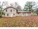 View of the back of the house and yard at 5734 Dorian Ct, Lithonia, GA 30058