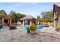 Resort-style backyard oasis with a large pool and spa at 120 Broad Meadows Ln, Fayetteville, GA 30215