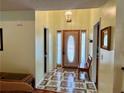 Bright entryway with tiled floor and bench seating at 75 Briar Patch Rd, Covington, GA 30014