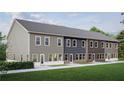 Rear view of four-unit townhome building showcasing various siding and brick at 3108 Marbella Cir # 4, Kennesaw, GA 30152