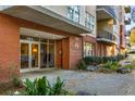 Brick building entrance with landscaping and signage at 384 Ralph Mcgill Blvd # 313, Atlanta, GA 30312