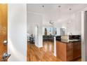 Open concept entryway with hardwood floors and kitchen at 384 Ralph Mcgill Blvd # 313, Atlanta, GA 30312