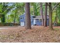 Newly renovated blue house with a spacious yard at 1730 Salina Dr, Jonesboro, GA 30236