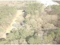 Aerial view of house on wooded lot near a road at 295 Hiram Acworth Hwy, Hiram, GA 30141