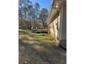 Wooden deck with stairs leading to the backyard at 1481 Estes Rd, Rutledge, GA 30663