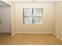 Bright dining area with neutral walls and tile flooring at 608 Woodknoll Ct, Jonesboro, GA 30238