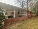 Screened porch with brick exterior at 2893 Heather Dr, Atlanta, GA 30344