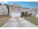 Two story house with double garage and stone accents at 3050 Centerglen Ln, Cumming, GA 30040