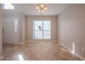 Bright dining area with tile floor and window at 12027 Harbour Town Pkwy, Fayetteville, GA 30215