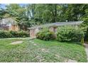 Brick house with a yard, and mature trees at 1279 Kenilworth Sw Dr, Atlanta, GA 30310
