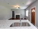 Modern kitchen with stainless steel sink and granite countertops at 1544 Childress Sw Dr, Atlanta, GA 30311