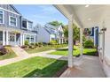 Front porch with walkway, providing access to a charming home community at 648 Liella Se Park, Atlanta, GA 30312