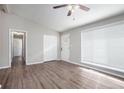 Bright living room with hardwood floors and access to hallway at 2707 Crescendo Nw Dr, Atlanta, GA 30318