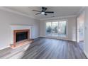 Living room with fireplace and sliding glass doors to patio at 1237 Wynford Woods Sw, Marietta, GA 30064