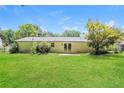 Back of house showing patio and spacious backyard at 3283 Clearview Sw Dr, Marietta, GA 30060