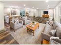 Open concept living room featuring hardwood floors and ample natural light at 522 Jo Ann Se Dr, Marietta, GA 30067