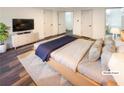 Bright and airy main bedroom with hardwood floors and ample closet space at 522 Jo Ann Se Dr, Marietta, GA 30067