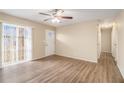 Bright living room featuring hardwood floors and lots of natural light at 6979 Bruce Cir, Lithonia, GA 30058