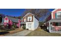 Two-story house with wood and vinyl siding, and a small front yard at 1041 Heritage Valley Rd, Norcross, GA 30093