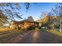 Brick house with a porch and spacious yard at 1526 N Cherokee N Rd, Social Circle, GA 30025