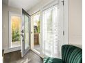 Interior view of double doors leading to a private patio at 9129 Selborne Ln, Chattahoochee Hills, GA 30268