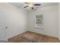 Bright bedroom with carpeted floors and a window with blinds at 3462 Mount Zion Rd, Stockbridge, GA 30281