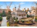 Two story home with driveway and manicured landscaping at 195 Worth Dr, Atlanta, GA 30327