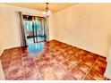 Bright dining room with tile floors and sliding glass doors to patio at 2705 Greystone Pl, Austell, GA 30106