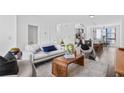 Open living space with kitchen views and hardwood floors at 966 Moda Dr, Atlanta, GA 30316